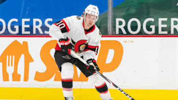 VANCOUVER, BC - APRIL 22: Ryan Dzingel #10 of the Ottawa Senators skates with the puck during NHL action against the Vancouver Canucks at Rogers Arena on April 22, 2021 in Vancouver, Canada. (Photo by Rich Lam/Getty Images)