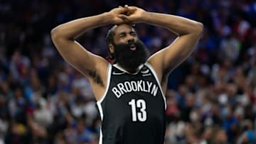 Oct 22, 2021; Philadelphia, Pennsylvania, USA; Brooklyn Nets guard James Harden (13) reacts after an apparently being struck in the face during the fourth quarter against the Philadelphia 76ers at Wells Fargo Center. Mandatory Credit: Bill Streicher-USA TODAY Sports