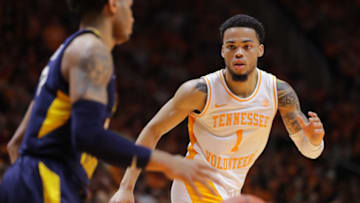 KNOXVILLE, TN - JANUARY 26: Lamonte Turner #1 of the Tennessee Volunteers lines up on defense in front of James Bolden #3 of the West Virginia Mountaineers during their game at Thompson-Boling Arena on January 26, 2019 in Knoxville, Tennessee. (Photo by Donald Page/Getty Images)