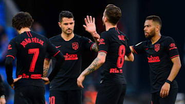 (L to R) Atletico Madrid's Portuguese forward Joao Felix, Atletico Madrid's Spanish midfielder Vitolo, Atletico Madrid's Spanish midfielder Saul Niguez and Atletico Madrid's Brazilian defender Renan Lodi gather on the pitch at the end of the Spanish League football match between Espanyol and Atletico Madrid at the Cornella-El Prat stadium in Cornella de Llobregat on March 1, 2020. (Photo by PAU BARRENA / AFP) (Photo by PAU BARRENA/AFP via Getty Images)