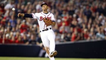 May 27, 2014; Atlanta, GA, USA; Atlanta Braves shortstop Andrelton Simmons (19) throws a runner out at first against the Boston Red Sox in the seventh inning at Turner Field. Mandatory Credit: Brett Davis-USA TODAY Sports