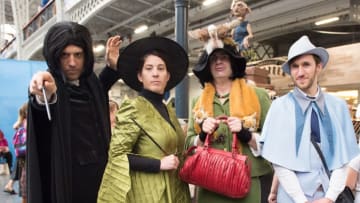 LONDON, ENGLAND - JULY 27: A Harry Potter Hogwarts Teachers cosplay group consisting of Professor Severus Snape, his Boggart, Professor Minerva McGonagall and a younger version of her seen during London Film and Comic Con 2019 at Olympia London on July 27, 2019 in London, England. (Photo by Ollie Millington/Getty Images)