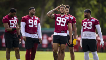 ASHBURN, VA - JUNE 10: Chase Young #99 of the Washington Football Team looks on with Shaka Toney #58, Daron Payne #94, Montez Sweat #90, and Jonathan Allen #93 during mandatory minicamp at Inova Sports Performance Center on June 10, 2021 in Ashburn, Virginia. (Photo by Scott Taetsch/Getty Images)