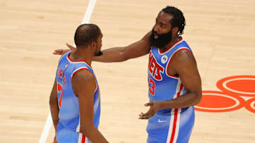 ATLANTA, GEORGIA - JANUARY 27: James Harden #13 and Kevin Durant #7 of the Brooklyn Nets converse in the finals seconds during the second half against the Atlanta Hawks at State Farm Arena on January 27, 2021 in Atlanta, Georgia. NOTE TO USER: User expressly acknowledges and agrees that, by downloading and or using this photograph, User is consenting to the terms and conditions of the Getty Images License Agreement. (Photo by Kevin C. Cox/Getty Images)