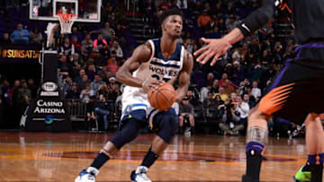 PHOENIX, AZ - DECEMBER 23: Jimmy Butler #23 of the Minnesota Timberwolves handles the ball against the Phoenix Suns on December 23, 2017 at Talking Stick Resort Arena in Phoenix, Arizona. NOTE TO USER: User expressly acknowledges and agrees that, by downloading and or using this photograph, user is consenting to the terms and conditions of the Getty Images License Agreement. Mandatory Copyright Notice: Copyright 2017 NBAE (Photo by Michael Gonzales/NBAE via Getty Images)