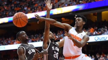 Nov 17, 2015; Syracuse, NY, USA; Syracuse Orange guard Franklin Howard (1) passes the ball around St. Bonaventure Bonnies forward Derrick Woods (20) during the first half at the Carrier Dome. Mandatory Credit: Rich Barnes-USA TODAY Sports