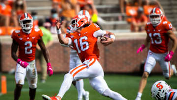 Oct 24, 2020; Clemson, South Carolina, USA; Clemson quarterback Trevor Lawrence (16) runs the ball during their game against Syracuse at Memorial Stadium. Mandatory Credit: Ken Ruinard-USA TODAY Sports