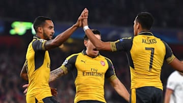 LONDON, ENGLAND - SEPTEMBER 28: Theo Walcott of Arsenal ceclebrates with team-mates Alexis Sanchez and Hector Bellerin after scoring the opening goal during the UEFA Champions League group A match between Arsenal FC and FC Basel 1893 at the Emirates Stadium on September 28, 2016 in London, England. (Photo by Mike Hewitt/Getty Images)