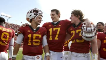 AMES, IA - OCTOBER 27: Quarterback Brock Purdy #15 of the Iowa State Cyclones celebrates with teammates quarterback Kyle Kempt #17, and linebacker Mike Rose #23 of the Iowa State Cyclones after defeating the Texas Tech Red Raiders 40-31 at Jack Trice Stadium on October 27, 2018 in Ames, Iowa. The Iowa State Cycloneswon 40-31 over the Texas Tech Red Raiders. (Photo by David Purdy/Getty Images)