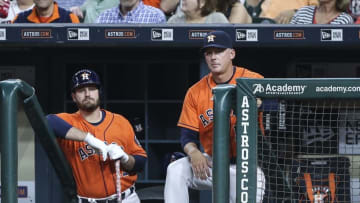 Apr 22, 2016; Houston, TX, USA; Houston Astros first baseman Tyler White (13) and manager A.J. Hinch (14) watch from the dugout during the sixth inning against the Boston Red Sox at Minute Maid Park. Mandatory Credit: Troy Taormina-USA TODAY Sports