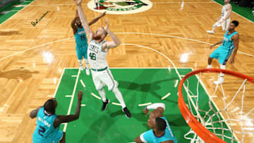 BOSTON, MA - OCTOBER 2: Aron Baynes #46 of the Boston Celtics grabs the rebound against the Charlotte Hornets on October 2, 2017 at the TD Garden in Boston, Massachusetts. NOTE TO USER: User expressly acknowledges and agrees that, by downloading and or using this photograph, User is consenting to the terms and conditions of the Getty Images License Agreement. Mandatory Copyright Notice: Copyright 2017 NBAE (Photo by Nathaniel S. Butler/NBAE via Getty Images)