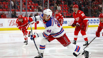 DETROIT, MI - DECEMBER 29: Michael Grabner #40 of the New York Rangers takes a third period shot in front of Mike Green #25 of the Detroit Red Wings at Little Caesars Arena on December 29, 2017 in Detroit, Michigan. Detroit won the game 3-2 in a shootout. (Photo by Gregory Shamus/Getty Images)