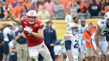 Jan 1, 2015; Tampa, FL, USA; Wisconsin Badgers safety Michael Caputo (7) celebrate a missed Auburn field goal in overtime of the 2015 Outback Bowl at Raymond James Stadium. The Badgers defeated the Tigers 34-31 in overtime. Mandatory Credit: Jonathan Dyer-USA TODAY Sports