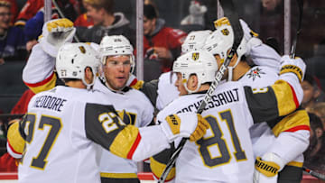 CALGARY, AB - MARCH 8: The Vegas Golden Knights celebrate the goal of Max Pacioretty #67 (R) against the Calgary Flames during an NHL game at Scotiabank Saddledome on March 8, 2020 in Calgary, Alberta, Canada. (Photo by Derek Leung/Getty Images)