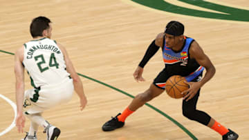 Shai Gilgeous-Alexander #2 of the OKC Thunder is defended by Pat Connaughton #24 of the Bucks. (Photo by Stacy Revere/Getty Images)