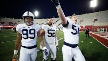 BLOOMINGTON, IN - OCTOBER 20: Robert Windsor #54, Ryan Bates #52 and Yetur Gross-Matos #99 of the Penn State Nittany Lions celebrate as they leave the field after the game against the Indiana Hoosiers at Memorial Stadium on October 20, 2018 in Bloomington, Indiana. Penn State won 33-28. (Photo by Joe Robbins/Getty Images)