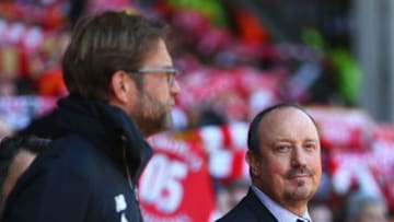 LIVERPOOL, ENGLAND - APRIL 23: Jurgen Klopp, manager of Liverpool iand Rafa Benitez, Manager of Newcastle United look on during the Barclays Premier League match between Liverpool and Newcastle United at Anfield on April 23, 2016 in Liverpool, United Kingdom. (Photo by Clive Brunskill/Getty Images)