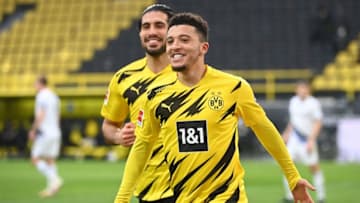 Dortmund's English midfielder Jadon Sancho celebrates scoring a penalty during the German first division Bundesliga football match between Borussia Dortmund and DSC Arminia Bielefeld in Dortmund, western Germany, on February 27, 2021. (Photo by Ina Fassbender / various sources / AFP) / DFL REGULATIONS PROHIBIT ANY USE OF PHOTOGRAPHS AS IMAGE SEQUENCES AND/OR QUASI-VIDEO (Photo by INA FASSBENDER/AFP via Getty Images)