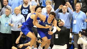 Duke basketball guard Jordan Goldwire and forward Wendell Moore celebrate a win at North Carolina (Photo by Streeter Lecka/Getty Images)