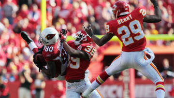 KANSAS CITY, MO - NOVEMBER 21: Early Doucet #80 of the Arizona Cardinals attempts to catch the ball as Brandon Carr #39 and Eric Berry #29 of the Kansas City Chiefs defend during the game on November 21, 2010 at Arrowhead Stadium in Kansas City, Missouri. (Photo by Jamie Squire/Getty Images)