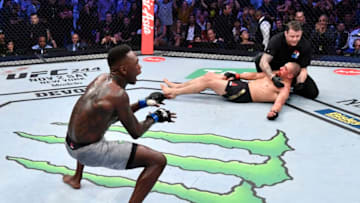 MELBOURNE, AUSTRALIA - OCTOBER 06: Israel Adesanya of Nigeria celebrates after his knockout victory over Robert Whittaker of New Zealand in their UFC middleweight championship fight during the UFC 243 event at Marvel Stadium on October 06, 2019 in Melbourne, Australia. (Photo by Jeff Bottari/Zuffa LLC/Zuffa LLC via Getty Images)