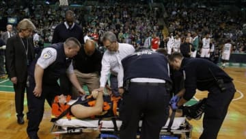 Jan 3, 2014; Boston, MA, USA; New Orleans Pelicans power forward Ryan Anderson (33) is taken off the court as they take on the Boston Celtics in the second half at TD Garden. The New Orleans Pelicans defeated the Boston Celtics 95-92. Mandatory Credit: David Butler II-USA TODAY Sports