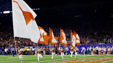 HOUSTON, TX - DECEMBER 27: Texas Longhorns celebrate a touchdown against the Missouri Tigers at NRG Stadium on December 27, 2017 in Houston, Texas. (Photo by Bob Levey/Getty Images)