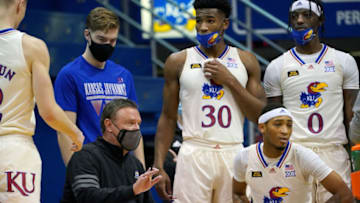 Dec 11, 2020; Lawrence, Kansas, USA; Kansas Jayhawks head coach Bill Self talks with players in a timeout during the second half against the Nebraska-Omaha Mavericks at Allen Fieldhouse. Mandatory Credit: Denny Medley-USA TODAY Sports
