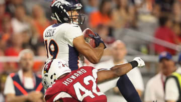 GLENDALE, AZ - AUGUST 30: Wide receiver Jordan Leslie #19 of the Denver Broncos makes a reception over defensive back A.J. Howard #42 of the Arizona Cardinals during the preseason NFL game at University of Phoenix Stadium on August 30, 2018 in Glendale, Arizona. (Photo by Christian Petersen/Getty Images)