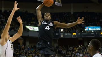 Dec 22, 2015; Winston-Salem, NC, USA; Xavier Musketeers guard Edmond Sumner (4) goes up to dunk the ball during the second half against the Wake Forest Demon Deacons at Lawrence Joel Veterans Memorial Coliseum. Xavier defeated Wake Forest 78-70. Mandatory Credit: Jeremy Brevard-USA TODAY Sports