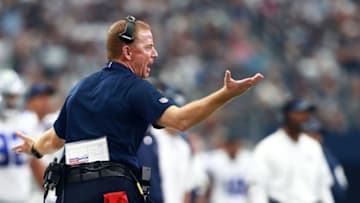 ARLINGTON, TX - OCTOBER 01: Head coach Jason Garrett of the Dallas Cowboys gestures from the sidelines during a game against the Los Angeles Rams at AT