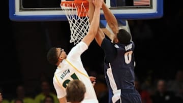 Apr 2, 2013; New York, NY, USA; Brigham Young Cougars player Brandon Davies (0) dunks against the Baylor Bears during the first half of the NIT Tournament Semi-Final at Madison Square Garden. Mandatory Credit: Joe Camporeale-USA TODAY Sports