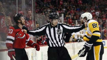 NEWARK, NJ - MARCH 29: Phil Kessel #81 of the Pittsburgh Penguins and Blake Coleman #20 of the New Jersey Devils exchange words late in the third period at the Prudential Center on March 29, 2018 in Newark, New Jersey. The Penguins defeated the Devils 4-3 in overtime. (Photo by Bruce Bennett/Getty Images)