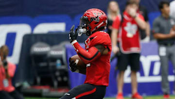 HOUSTON, TX - SEPTEMBER 01: Da'Leon Ward #21 of the Texas Tech Red Raiders rushes for a 9 yard touchdown in the third quarter against the Mississippi Rebels at NRG Stadium on September 1, 2018 in Houston, Texas. (Photo by Bob Levey/Getty Images)