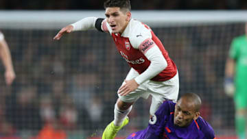 LONDON, ENGLAND - NOVEMBER 03: Lucas Torreira of Arsenal is tackled by Fabinho of Liverpool during the Premier League match between Arsenal FC and Liverpool FC at Emirates Stadium on November 3, 2018 in London, United Kingdom. (Photo by Mark Leech/Offside/Getty Images)