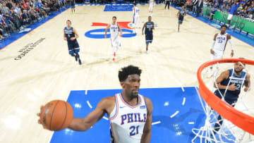 PHILADELPHIA,PA - MARCH 24 : Joel Embiid #21 of the Philadelphia 76ers dunks the ball against the Minnesota Timberwolves at Wells Fargo Center on March 24, 2018 in Philadelphia, Pennsylvania NOTE TO USER: User expressly acknowledges and agrees that, by downloading and/or using this Photograph, user is consenting to the terms and conditions of the Getty Images License Agreement. Mandatory Copyright Notice: Copyright 2018 NBAE (Photo by Jesse D. Garrabrant/NBAE via Getty Images)