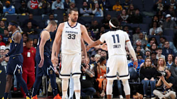 MEMPHIS, TN - JANUARY 28: Marc Gasol #33 and Mike Conley #11 of the Memphis Grizzlies hi-five on January 28, 2019 at FedExForum in Memphis, Tennessee. NOTE TO USER: User expressly acknowledges and agrees that, by downloading and or using this photograph, User is consenting to the terms and conditions of the Getty Images License Agreement. Mandatory Copyright Notice: Copyright 2019 NBAE (Photo by Joe Murphy/NBAE via Getty Images)