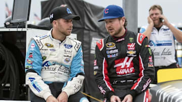 Nov 4, 2016; Fort Worth, TX, USA; Sprint Cup Series driver Brian Scott (left) and driver Kurt Busch (right) during qualifying for the AAA Texas 500 at Texas Motor Speedway. Mandatory Credit: Jerome Miron-USA TODAY Sports