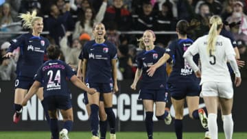 Apr 1, 2023; San Diego, California, USA; San Diego Wave FC attacker Alex Morgan (13) celebrates after scoring their third goal during the second half against the North Carolina Courage at Snapdragon Stadium. Mandatory Credit: Kelvin Kuo-USA TODAY Sports