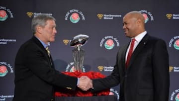 Dec 30, 2015; Los Angeles, CA, USA; Iowa Hawkeyes coach Kirk Ferentz (left) and Stanford Cardinal coach David Shaw pose with the Leishman Trophy during press conference in advance of the 102nd Rose Bowl at the L.A. Hotel Downtown. Mandatory Credit: Kirby Lee-USA TODAY Sports