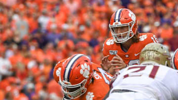 Clemson quarterback Trevor Lawrence (16) takes the snap with Florida State in Clemson, South Carolina Saturday, October 12, 2019.Clemson Fsu 2019