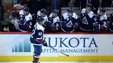 Nov 28, 2015; Denver, CO, USA; Colorado Avalanche left wing Gabriel Landeskog (92) celebrates his goal with teammates on the bench in the first period against the Winnipeg Jets at the Pepsi Center. Mandatory Credit: Ron Chenoy-USA TODAY Sports