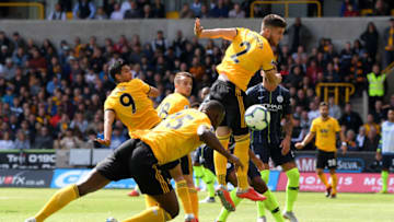 WOLVERHAMPTON, ENGLAND - AUGUST 25: Willy Boly of Wolverhampton Wanderers scores his side's first goal during the Premier League match between Wolverhampton Wanderers and Manchester City at Molineux on August 25, 2018 in Wolverhampton, United Kingdom. (Photo by Shaun Botterill/Getty Images)