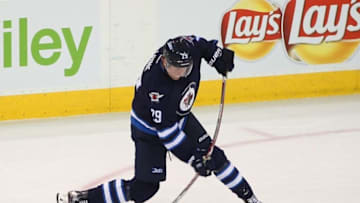 Dec 1, 2016; Winnipeg, Manitoba, CAN; Winnipeg Jets Patrick Laine (29) stick flexes as he takes a shot on the Edmonton Oilers net in the second period during the NHL hockey game against the Edmonton Oilers at MTS Centre. Mandatory Credit: Ray Peters-USA TODAY Sports