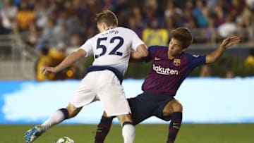 PASADENA, CA - JULY 28: Ricard Puig #8 of Barcelona plays the ball from Oliver Skipp #52 of Tottenham Hotspur during the second half of the International Champions Cup 2018 match at Rose Bowl on July 28, 2018 in Pasadena, California. Barcelona defeated Tottenham 5-3 on penalties after a 1-1 draw in regulation. (Photo by Victor Decolongon/Getty Images)