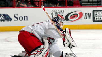 RALEIGH, NC - OCTOBER 10: Sergei Bobrovsky #72 of the Columbus Blue Jackets covers a loose puck during an NHL game against the Carolina Hurricanes on October 10, 2017 at PNC Arena in Raleigh, North Carolina. (Photo by Gregg Forwerck/NHLI via Getty Images)