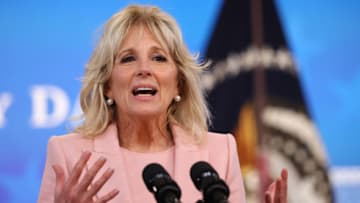 WASHINGTON, DC - MARCH 24: U.S. first lady Jill Biden delivers remarks during an Equal Pay Day event in the South Court Auditorium in the Eisenhower Executive Office Building on March 24, 2021 in Washington, DC. Highlighting the gender pay gap, Equal Pay Day raises awareness that women in the United States earned $0.82 for every dollar men earned in 2019, according to the National Committee on Pay Equity. (Photo by Chip Somodevilla/Getty Images)