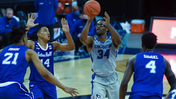 Jan 6, 2021; Omaha, Nebraska, USA; Creighton Bluejays guard Denzel Mahoney (34) throws up a lob attempt against Seton Hall Pirates center Ike Obiagu (21) abd forward Tyrese Samuel (4) and guard Jared Rhoden (14) in the second half at CHI Health Center Omaha. Mandatory Credit: Steven Branscombe-USA TODAY Sports
