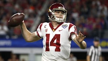 ARLINGTON, TX - DECEMBER 29: Sam Darnold No. 14 of the USC Trojans looks to throw against the Ohio State Buckeyes in the first half of the 82nd Goodyear Cotton Bowl Classic between USC and Ohio State at AT&T Stadium on December 29, 2017 in Arlington, Texas. (Photo by Ron Jenkins/Getty Images)