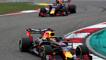 SHANGHAI, CHINA - APRIL 14: Max Verstappen of the Netherlands driving the (33) Aston Martin Red Bull Racing RB15 leads Pierre Gasly of France driving the (10) Aston Martin Red Bull Racing RB15 on track during the F1 Grand Prix of China at Shanghai International Circuit on April 14, 2019 in Shanghai, China. (Photo by Mark Thompson/Getty Images)